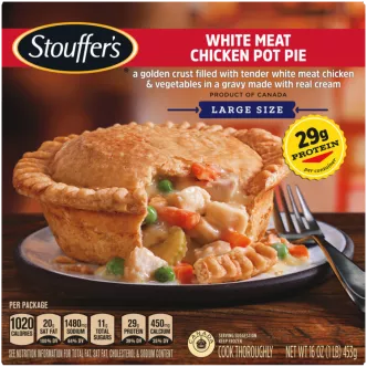 Box of White Meat Chicken Pot Pie featuring a plate with flaky pie crust and vegetables below the product name and logo.