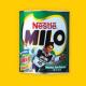 A vintage container of MILO with an illustration of a soccer player.
